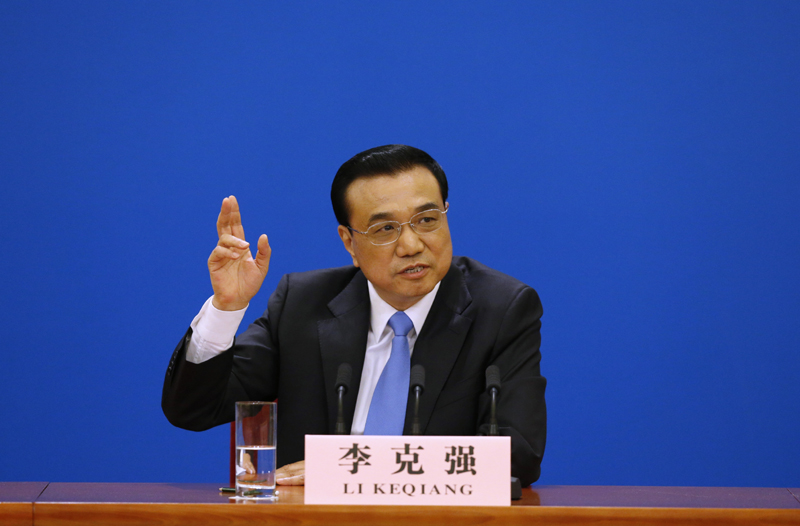 3月15日，國務(wù)院總理李克強在北京人民大會堂與中外記者見面，并回答記者提問。 新華社記者 沈伯韓 攝