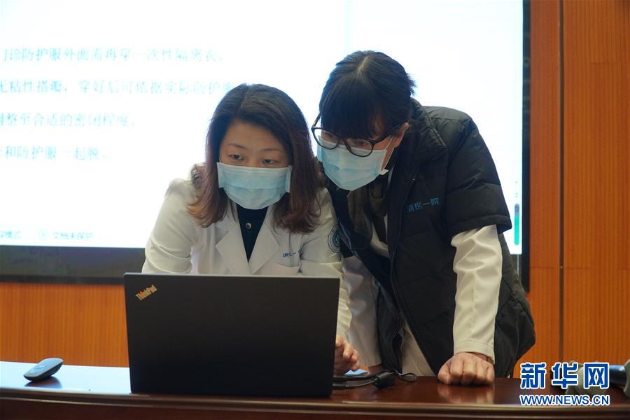 （聚焦疫情防控·圖文互動）（5）無法握手，但始終并肩