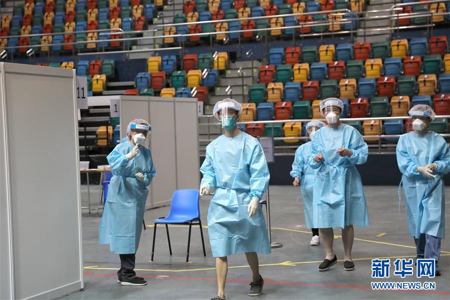 （圖文互動）（2）&ldquo;身為醫(yī)護(hù)人員一分子，應(yīng)該出來幫忙&rdquo;&mdash;&mdash;參與新冠病毒社區(qū)檢測的香港醫(yī)護(hù)人員速寫