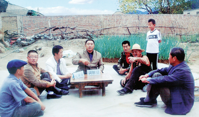 調(diào)解&ldquo;家長里短，雞毛蒜皮&rdquo;的小事情是李培斌從事的大事業(yè)