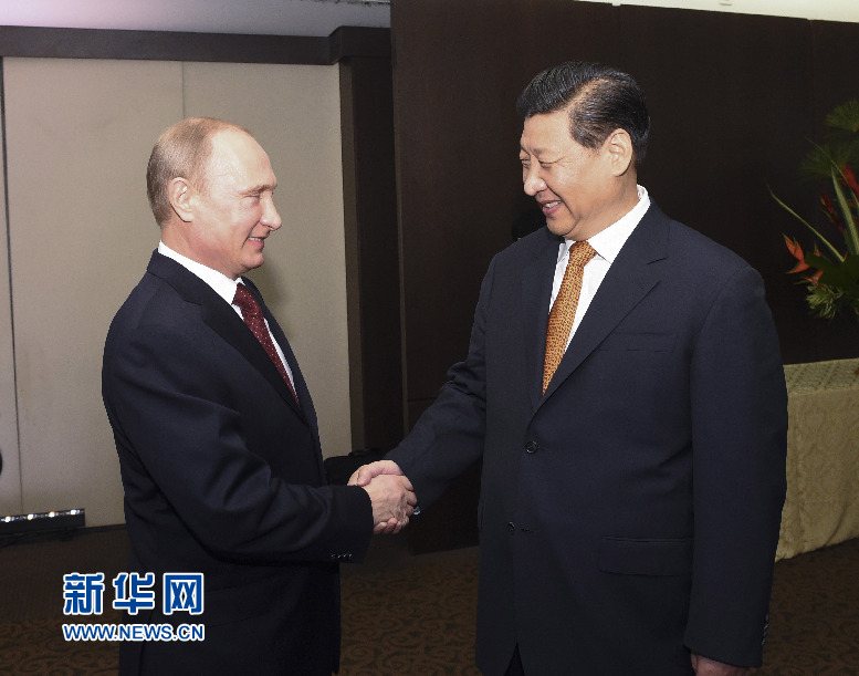 7月14日，國(guó)家主席習(xí)近平在巴西福塔萊薩會(huì)見(jiàn)俄羅斯總統(tǒng)普京。新華社記者李學(xué)仁攝