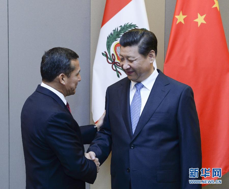 7月16日，國家主席習(xí)近平在巴西首都巴西利亞會見秘魯總統(tǒng)烏馬拉。新華社記者 劉建生 攝 