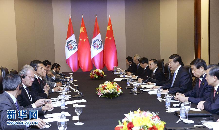 7月16日，國家主席習(xí)近平在巴西首都巴西利亞會見秘魯總統(tǒng)烏馬拉。新華社記者 劉建生 攝  