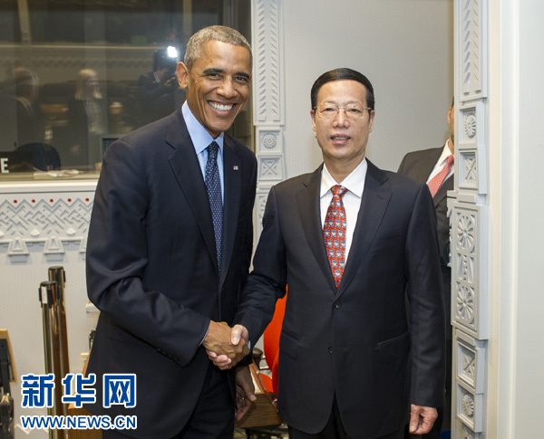 9月23日，國家主席習(xí)近平特使、國務(wù)院副總理張高麗在紐約會見出席聯(lián)合國氣候峰會的美國總統(tǒng)奧巴馬。 新華社記者王曄攝