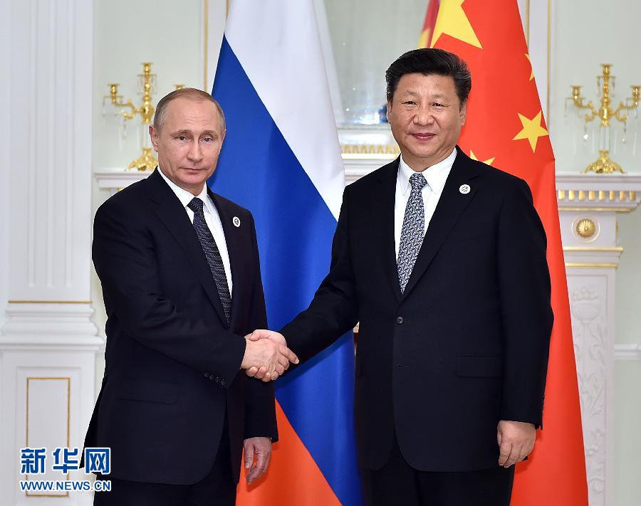 6月23日，國家主席習(xí)近平在烏茲別克斯坦塔什干會見俄羅斯總統(tǒng)普京。新華社記者李濤攝
