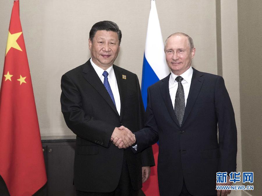 6月8日，國(guó)家主席習(xí)近平在阿斯塔納會(huì)見(jiàn)俄羅斯總統(tǒng)普京。 新華社記者蘭紅光 攝